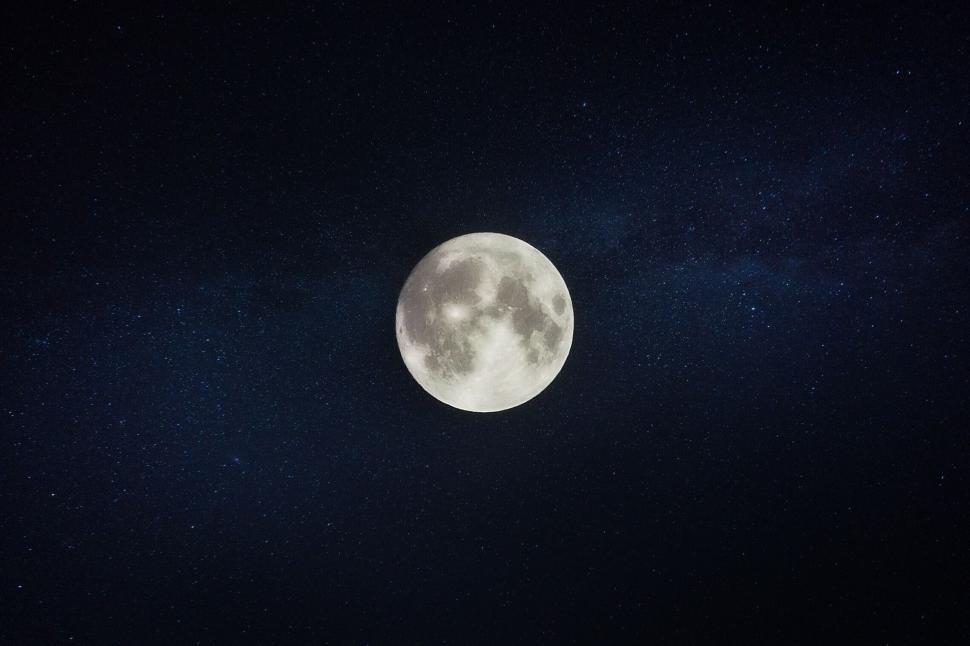 Free Image of Full moon against a starry night sky 
