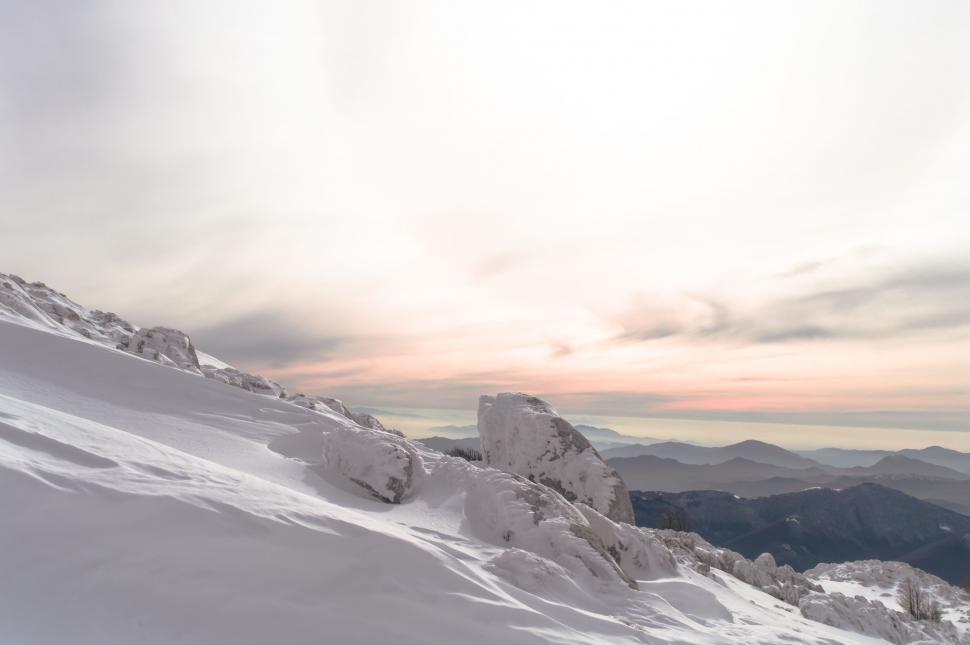 Free Image of Snowy mountain landscape at sunset 