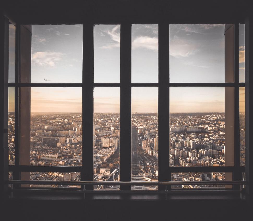 Free Image of City skyline viewed through a window 