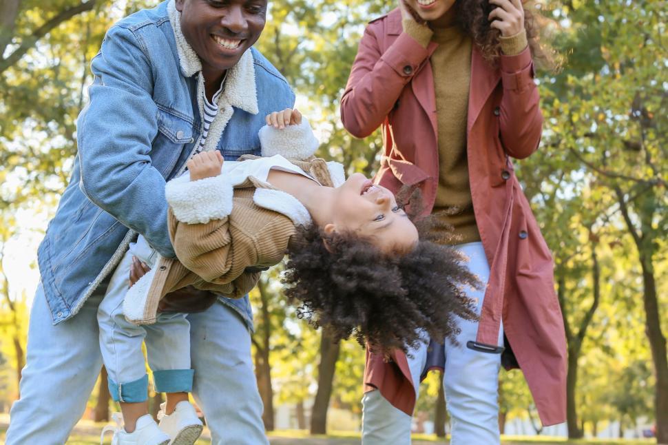 Free Image of Family with toddler enjoying a day in park 