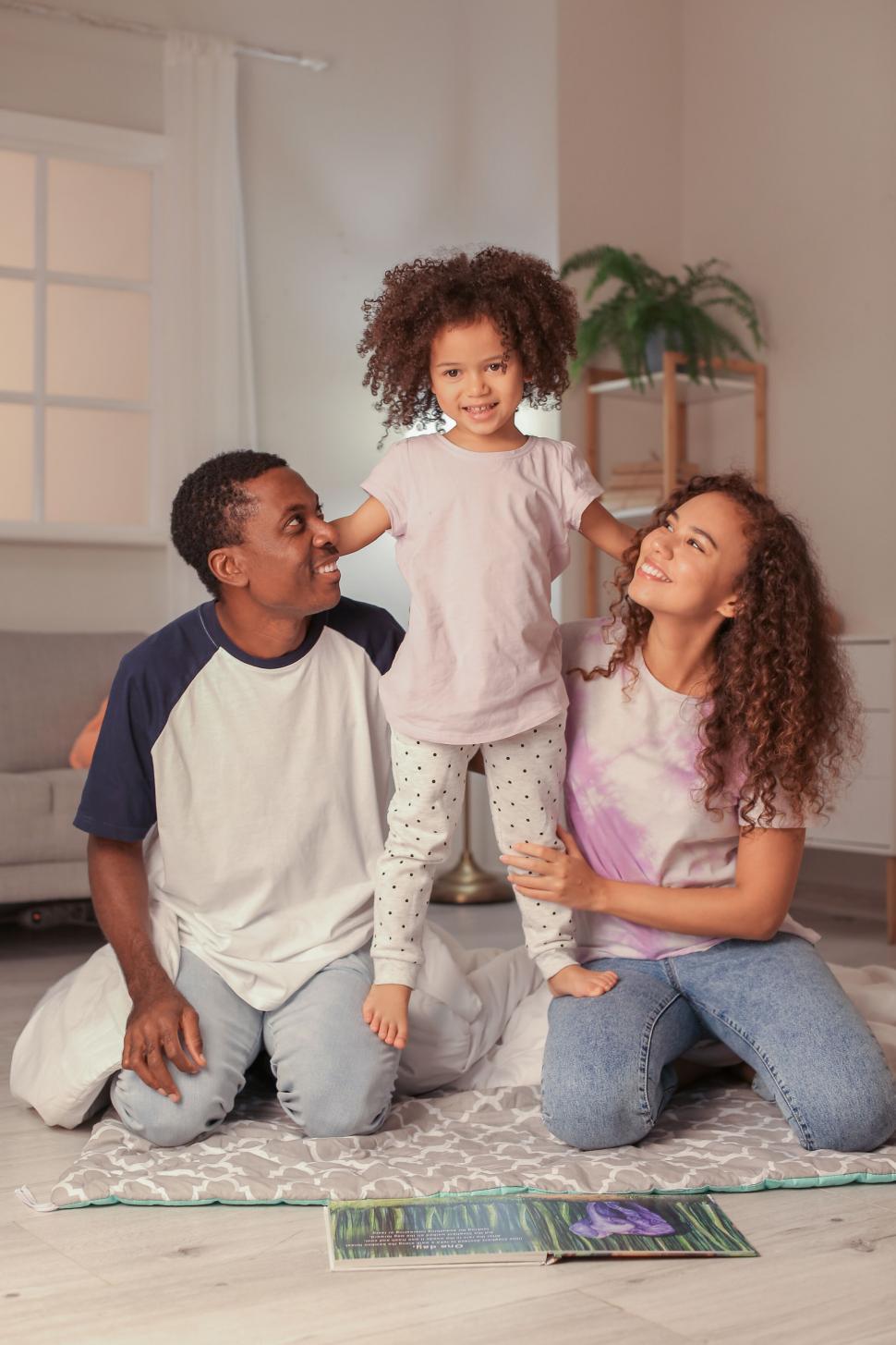 Free Image of Family enjoying time at home together 
