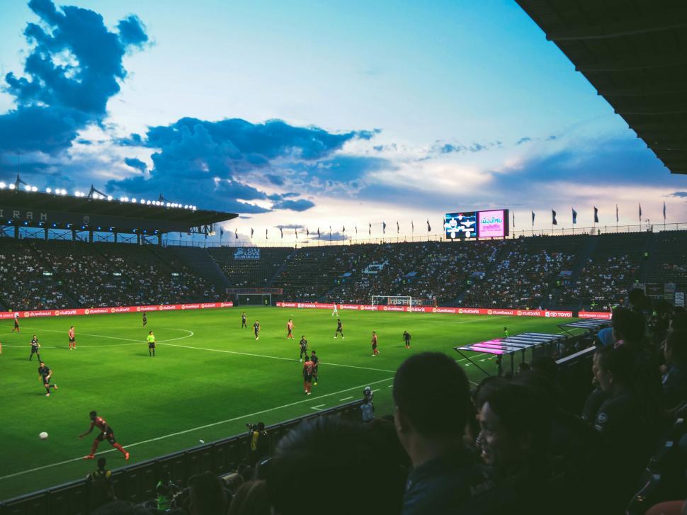 Free Image of Soccer match in stadium at dusk 