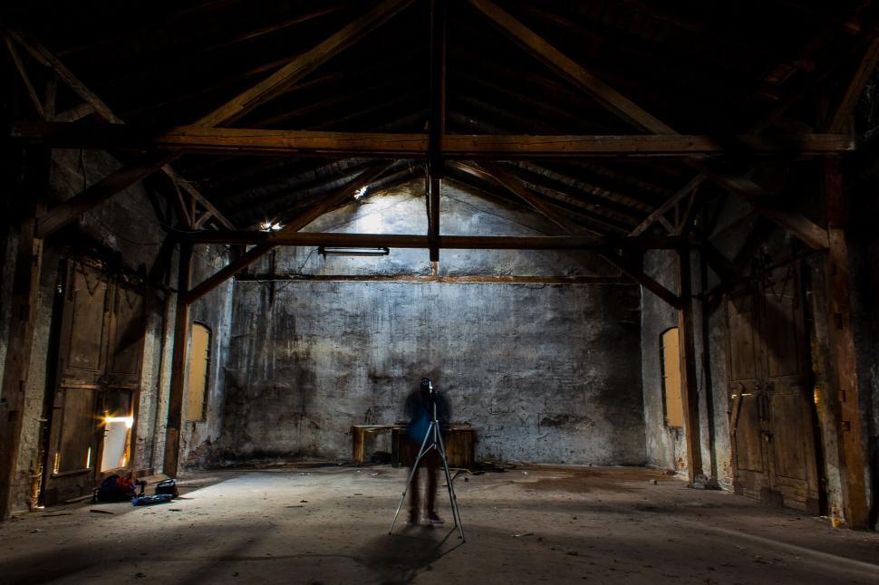 Free Image of Spooky figure in abandoned attic 