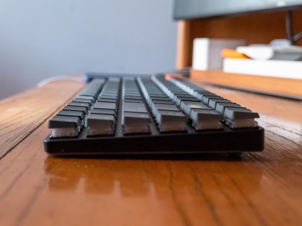 Free Image of Sleek black mechanical keyboard on desk 