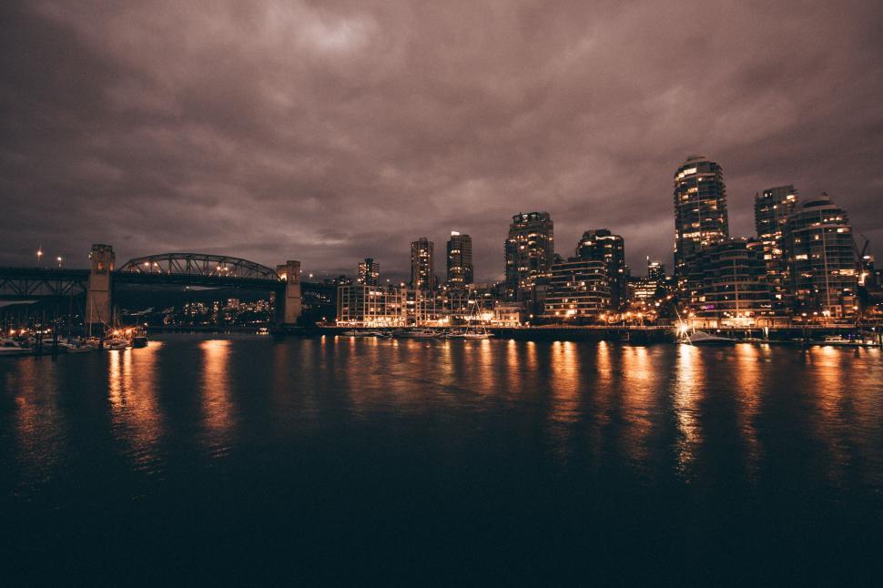 Free Image of Moody cityscape at twilight with bridge 