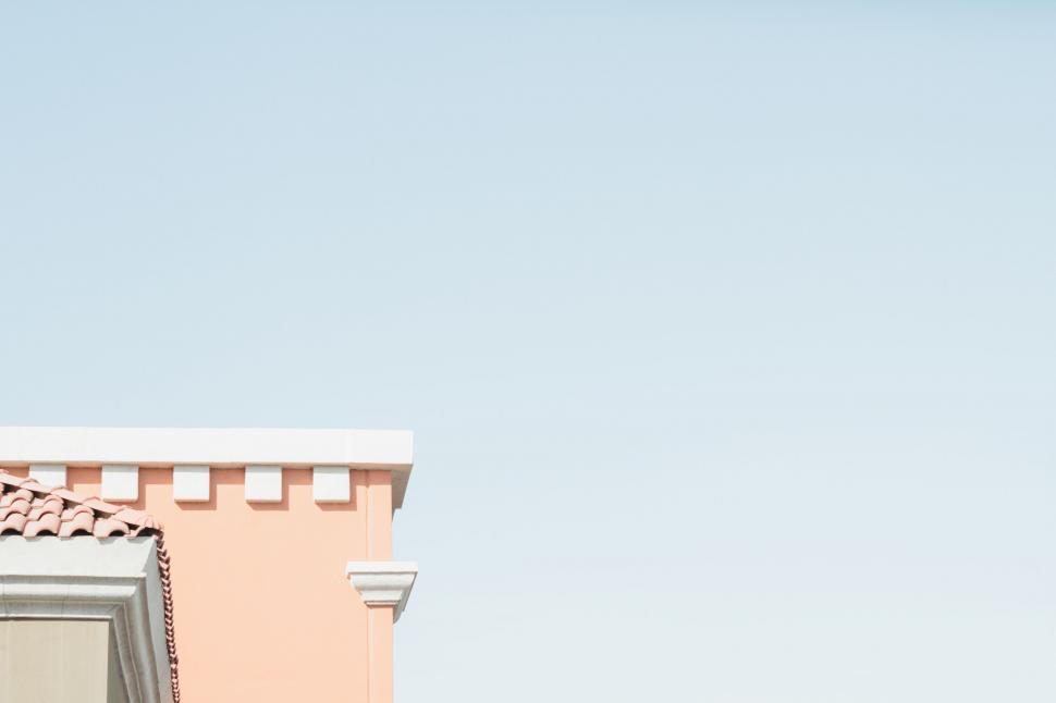Free Image of Peach-colored building under clear sky simplicity 