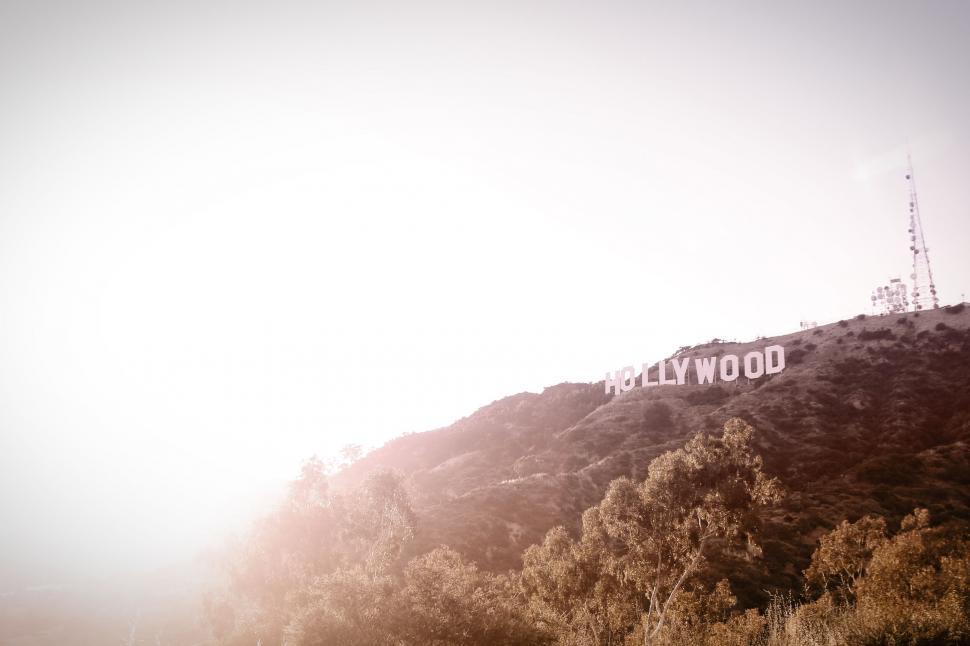Free Image of Sunrise glow over iconic Hollywood sign 