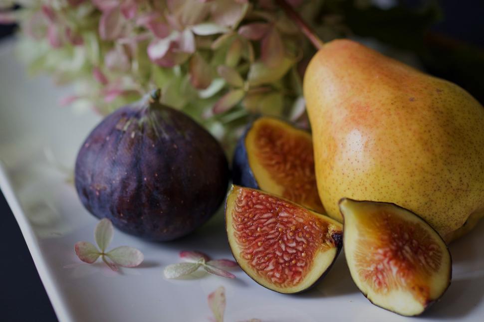 Free Image of Fig and pear composition on a white plate 
