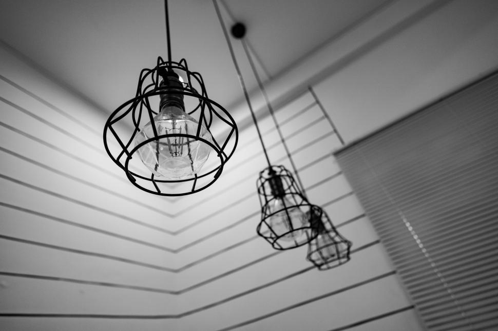 Free Image of Monochrome interior with designer lamps 
