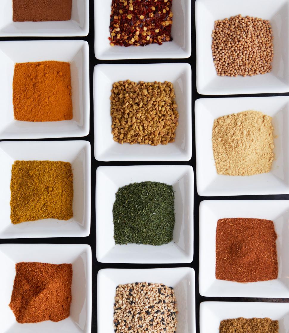 Free Image of Assorted collection of spices in white dishes 