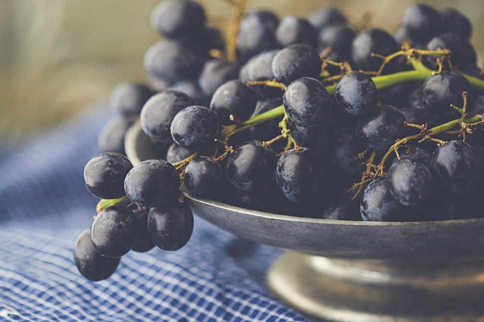 Free Image of Bunch of dark grapes in a vintage bowl 
