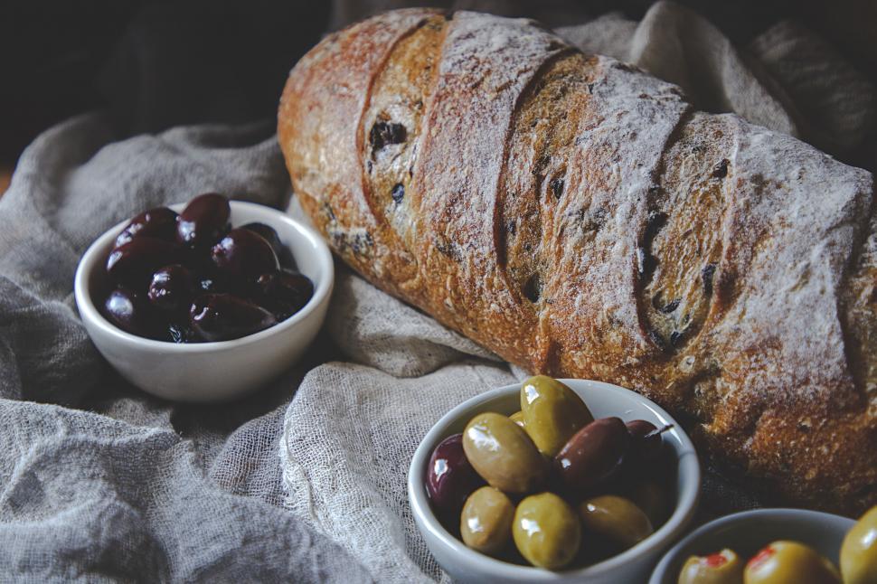 Free Image of Artisan bread with mixed olives in bowls 