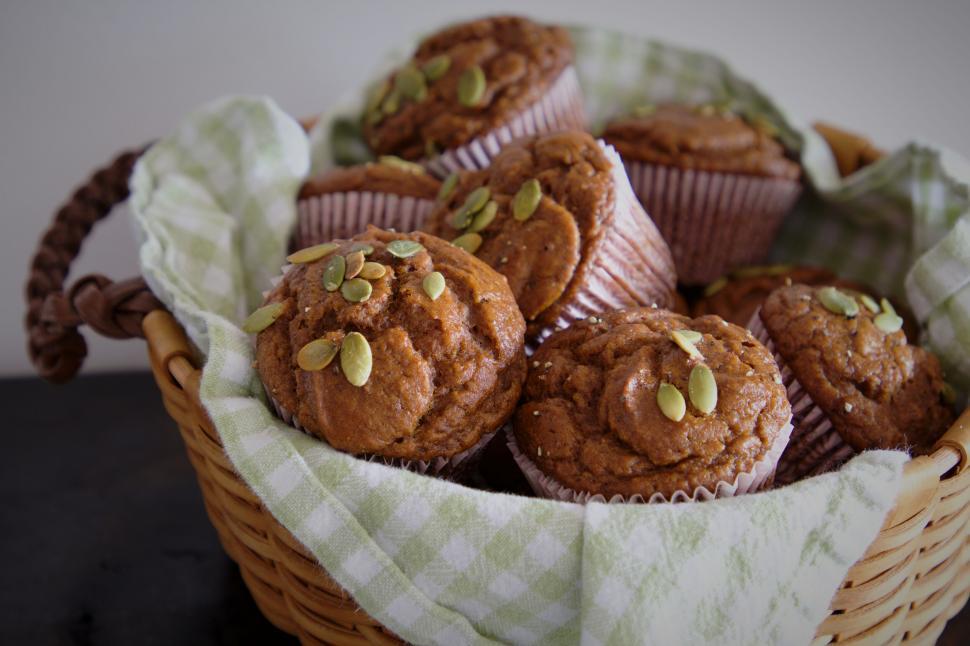 Free Image of Pumpkin muffins in a basket with a checkered napkin 