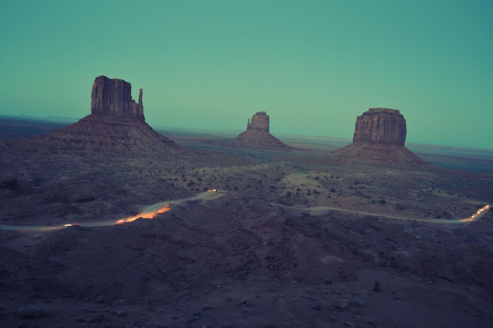Free Image of Twilight hues over iconic Monument Valley 