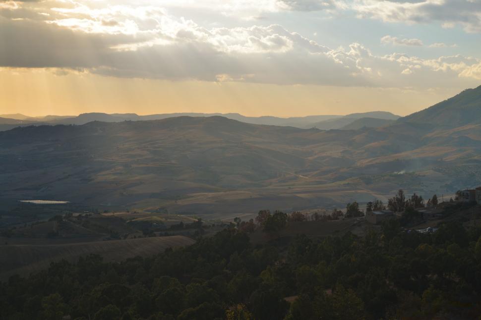 Free Image of Rolling hills landscape during golden hour 