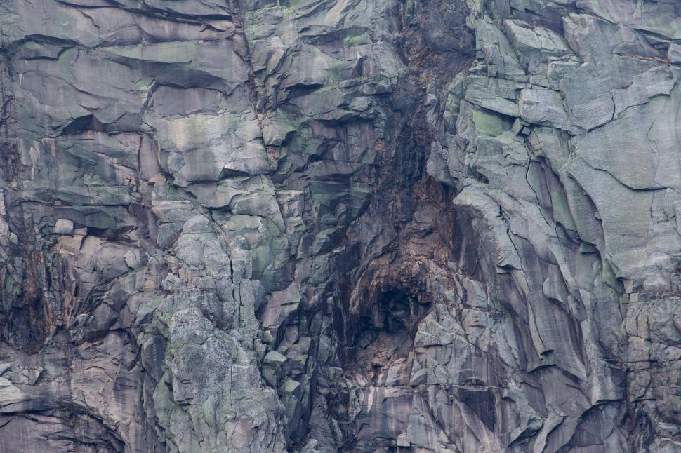 Free Image of Rough textures of a sheer cliff face 