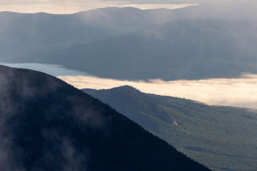 Free Image of Misty mountain range at sunrise 