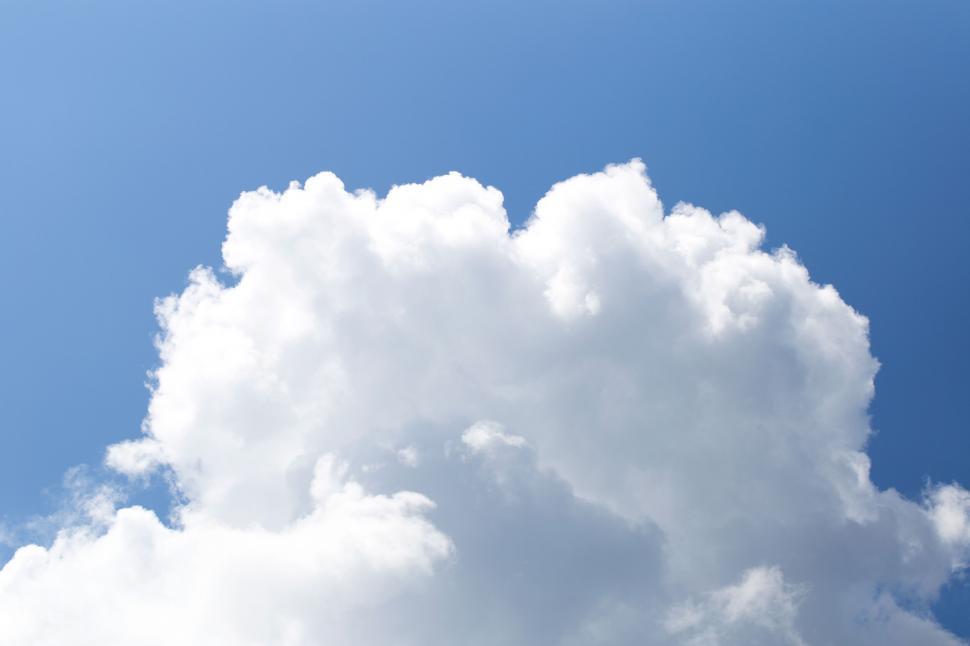 Free Image of Fluffy white cloud isolated on blue sky 