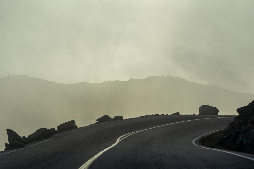 Free Image of Misty mountain road at dawn 
