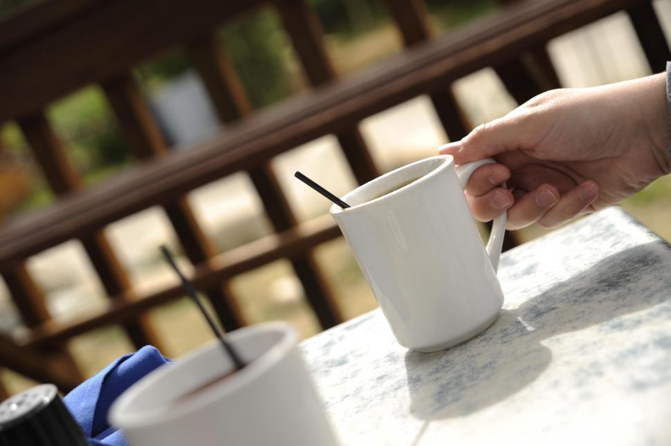 Free Image of Coffee Mug and Hand 