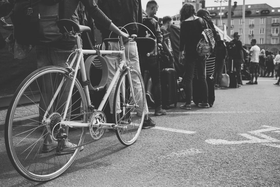Free Image of Bicycle leaning against a crowded street 