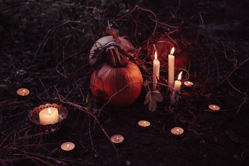 Free Image of Halloween pumpkin arrangement with candles 