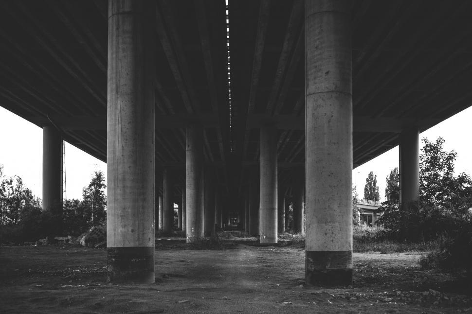 Free Image of Underneath the Bridge s Concrete Pillars 