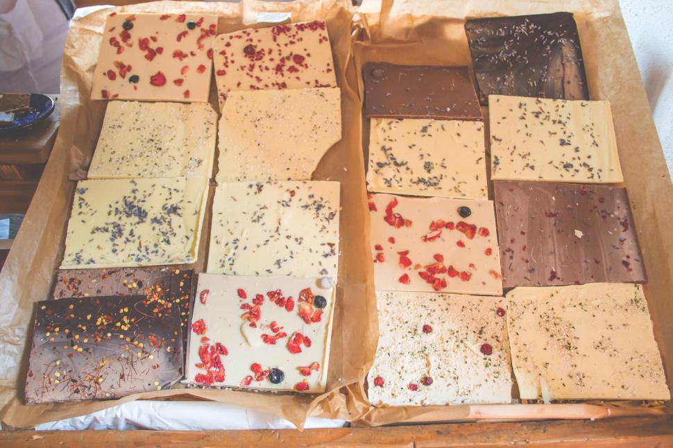Free Image of Assorted chocolate slabs with toppings 