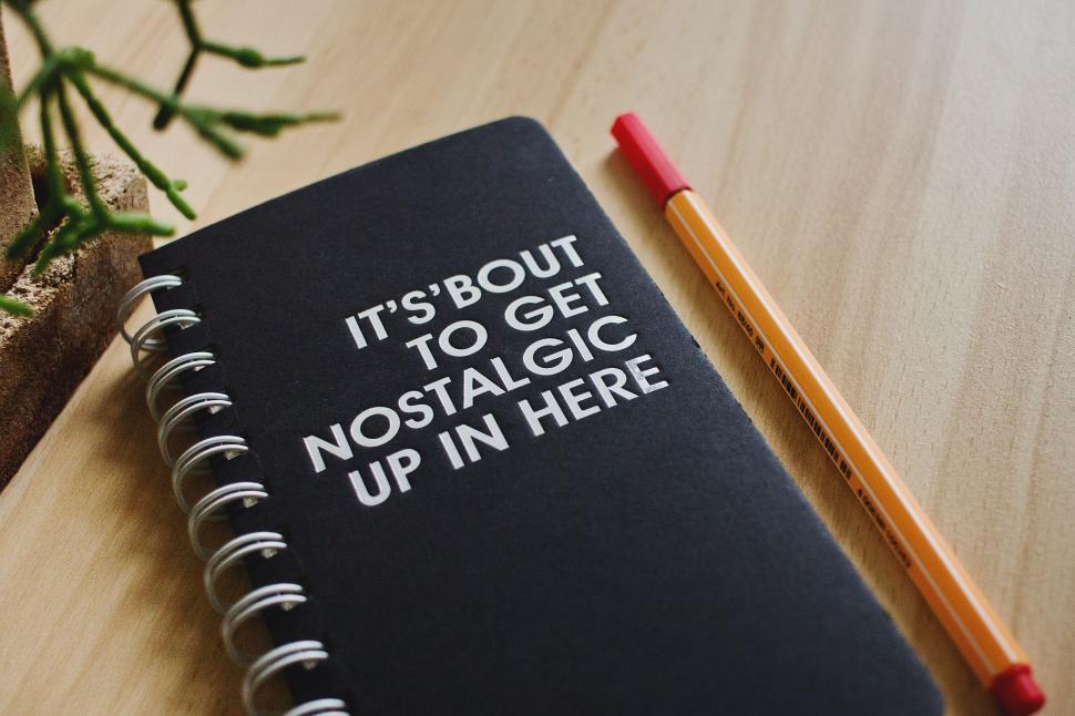 Free Image of Notebook with nostalgic quote on cover 