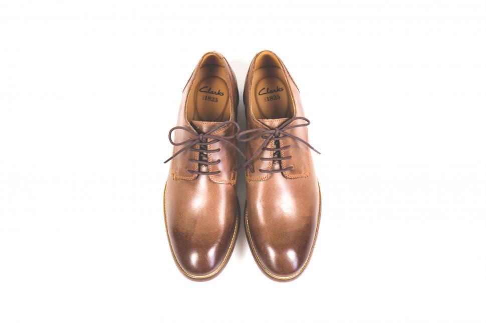 Free Image of Pair of shiny brown leather dress shoes 