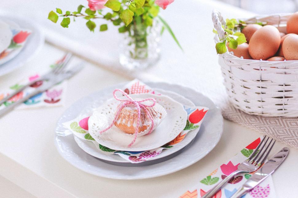 Free Image of Easter eggs and cake on a decorated table 