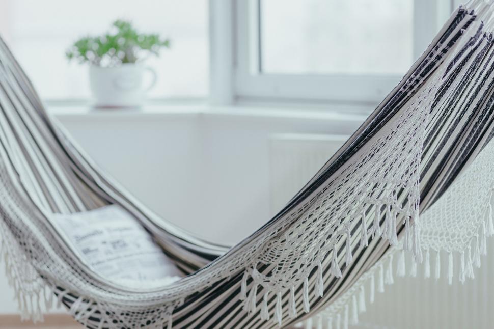 Free Image of Hammock in a cozy room with natural light 