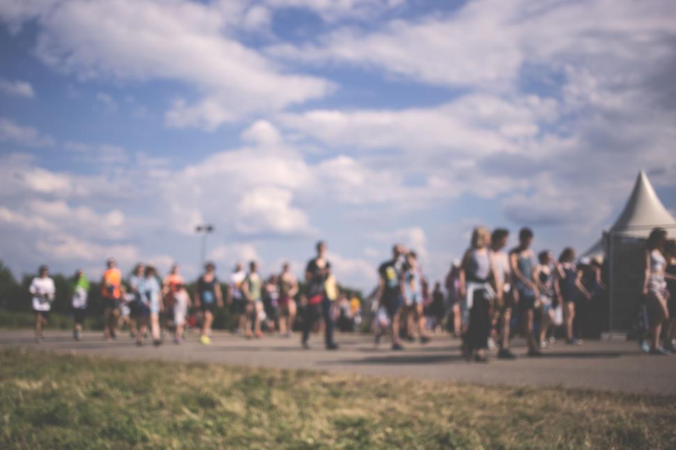 Free Image of Blurry crowd at an outdoor event 