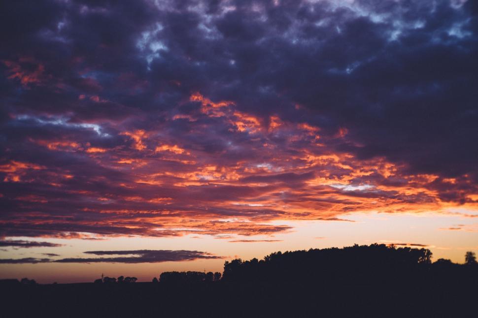 Free Image of Fiery sunset over tranquil countryside 