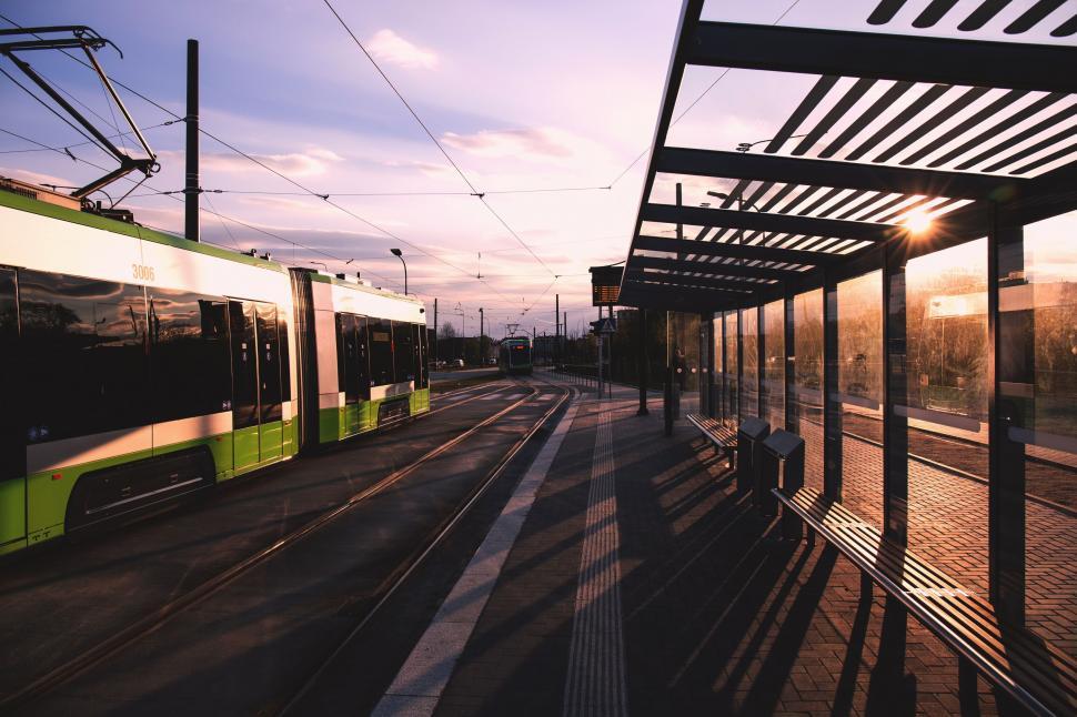 Free Image of Deserted tram stop at sunset 