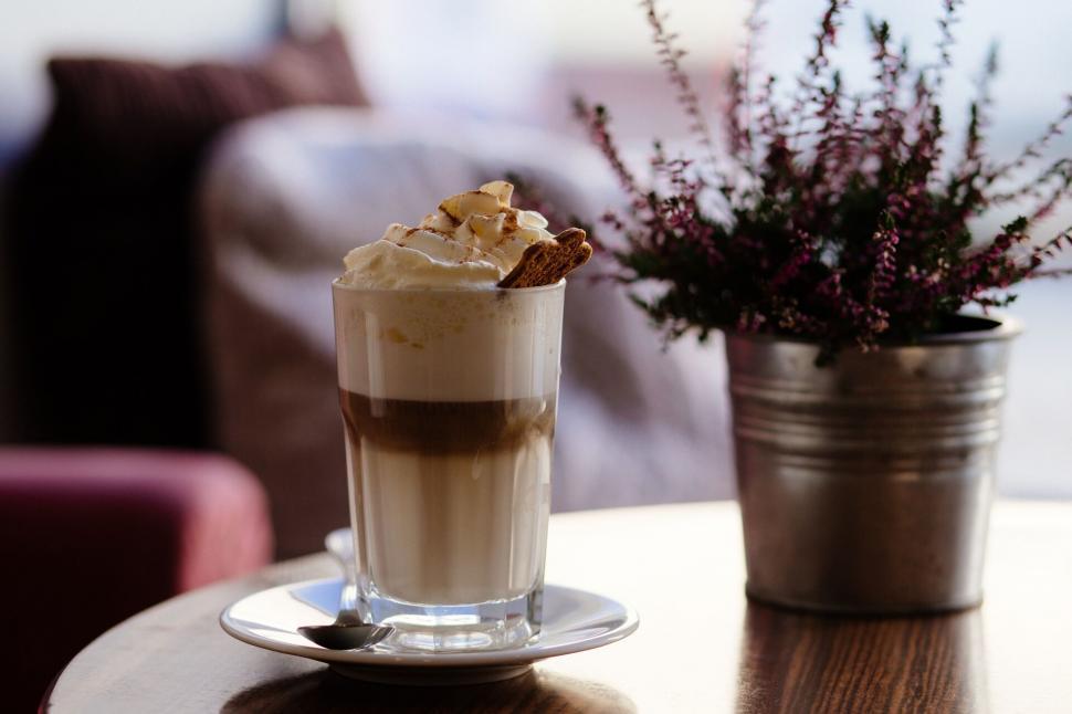 Free Image of Coffee with cream and biscuit topping 