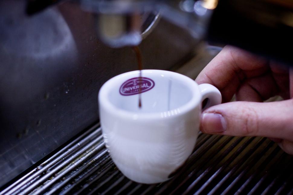 Free Image of Espresso shot being poured into a cup 