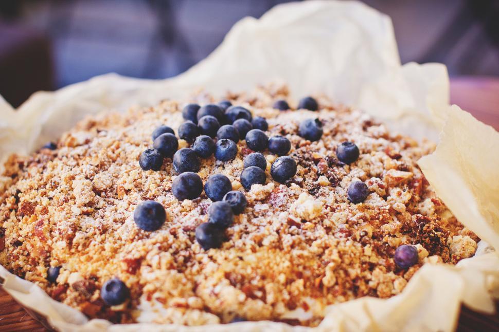 Free Image of Homemade blueberry crumble pie on table 