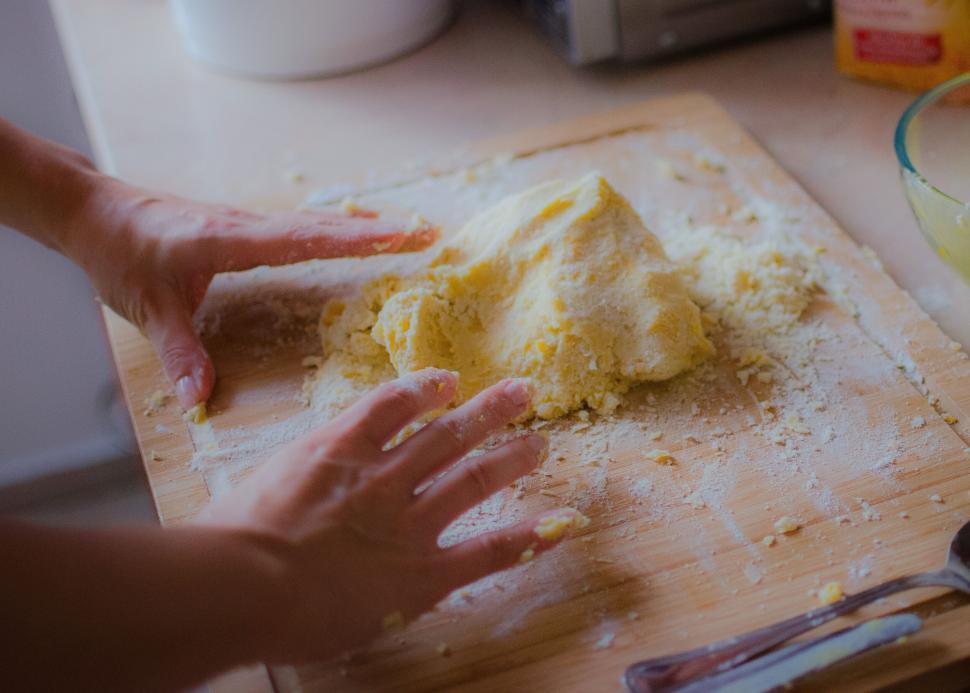 Free Image of Kneading dough on a floured surface 