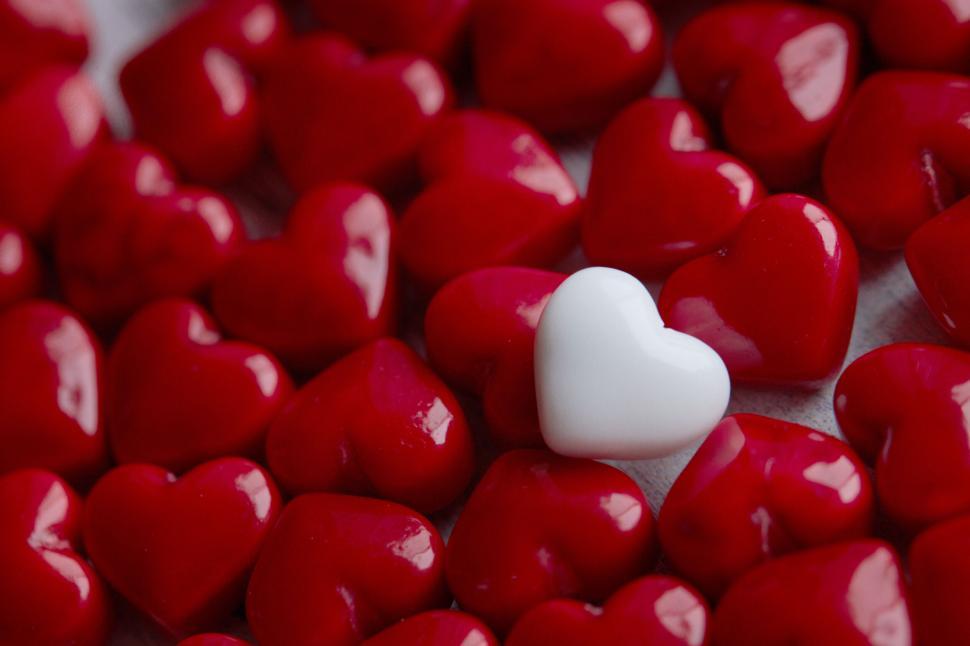 Free Image of Red hearts with one unique white heart 