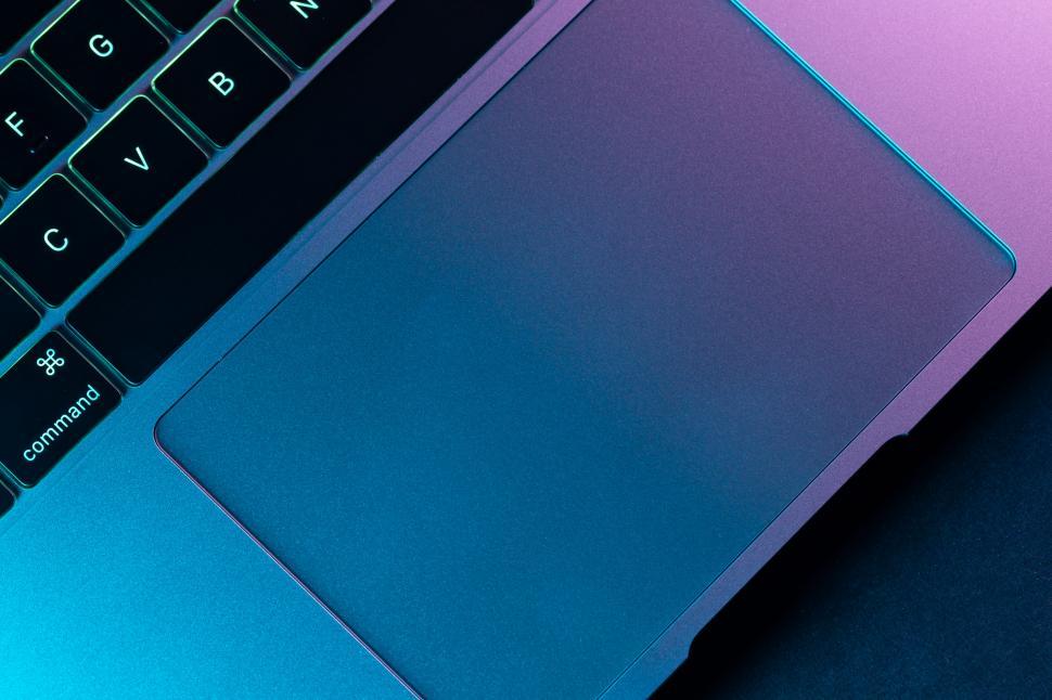Free Image of Modern Laptop on Dual-tone Background 