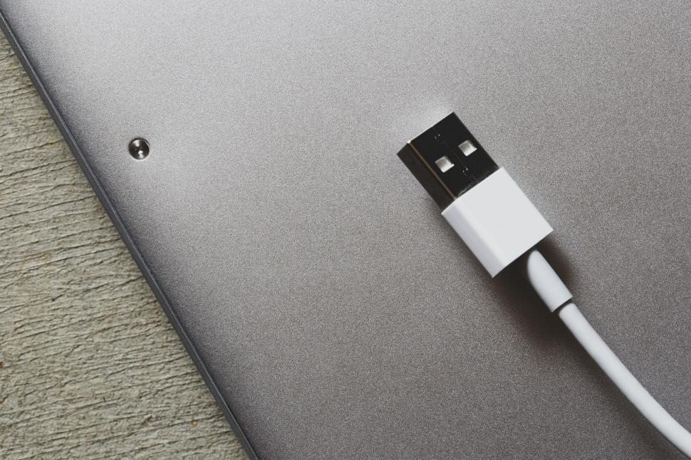 Free Image of USB Cable and Portable Device Close-up 