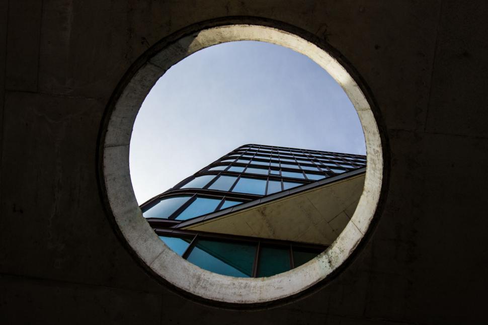 Free Image of Circular view of modern building through hole 