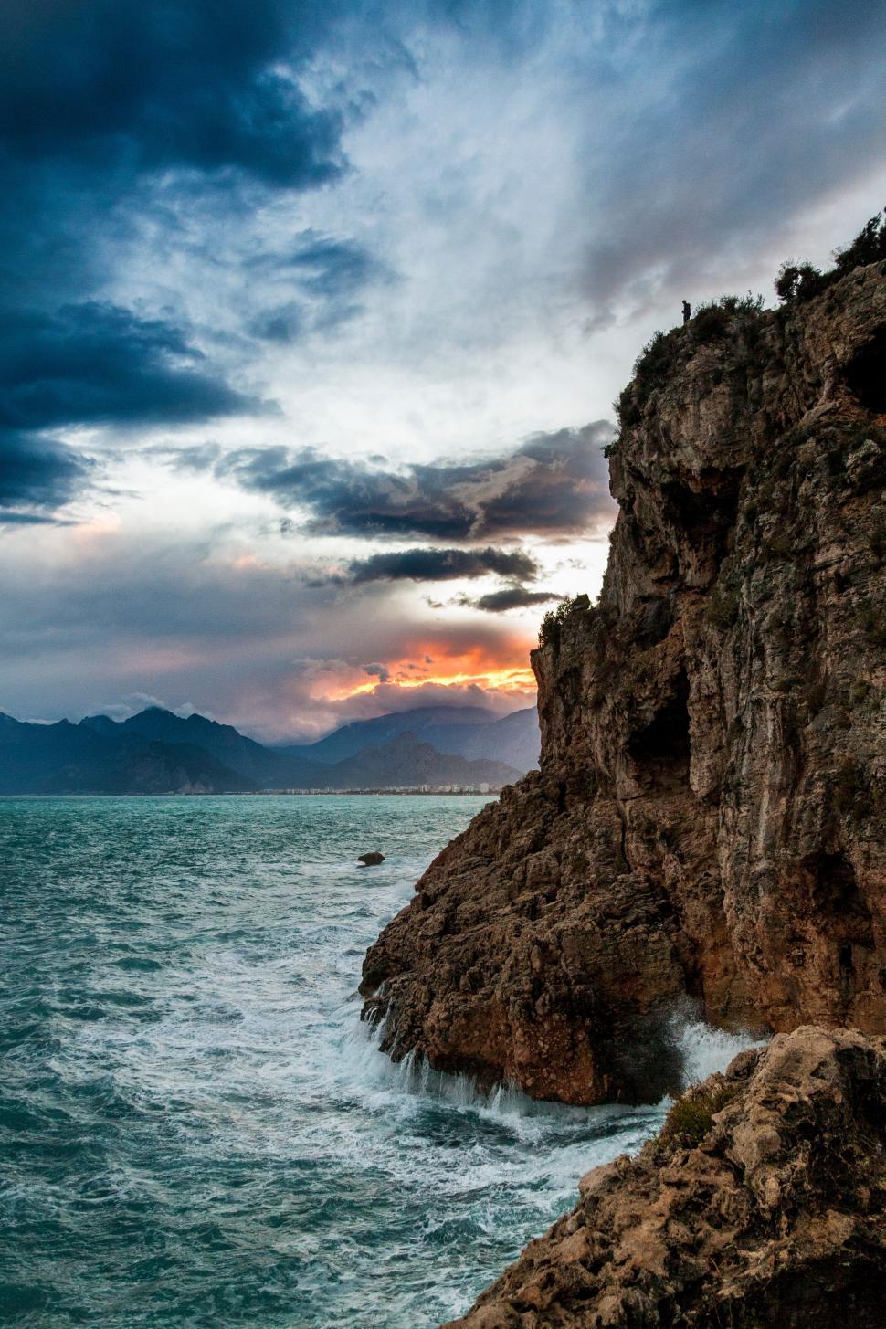 Free Image of Dramatic seascape with cliff and sunset 