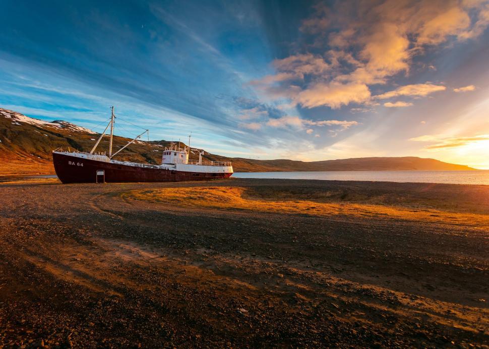 Free Image of Abandoned ship in sunset on Icelandic fjord 