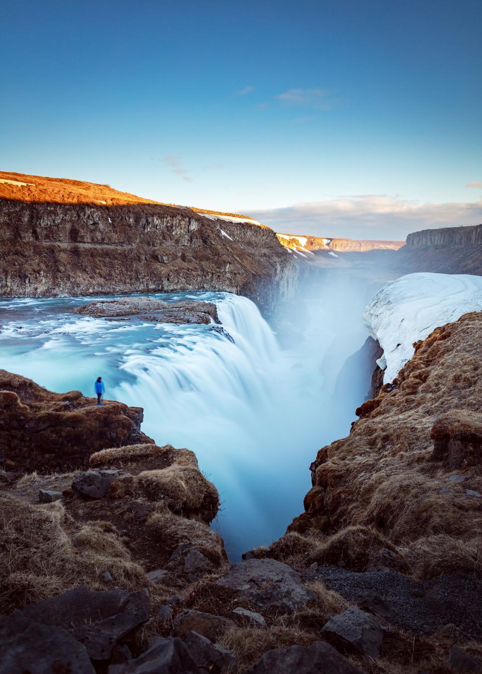 Free Image of Icelandic waterfall with human observer 