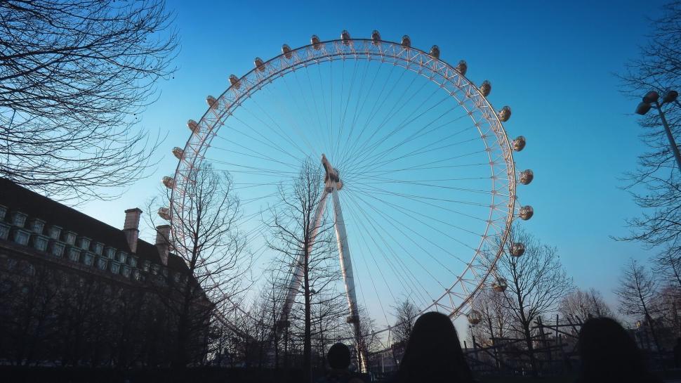 Free Image of Silhouette of Ferris wheel against sky 