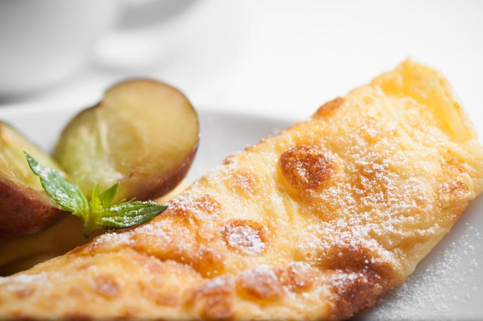 Free Image of Deep-fried sugared slice of apple pie on plate 