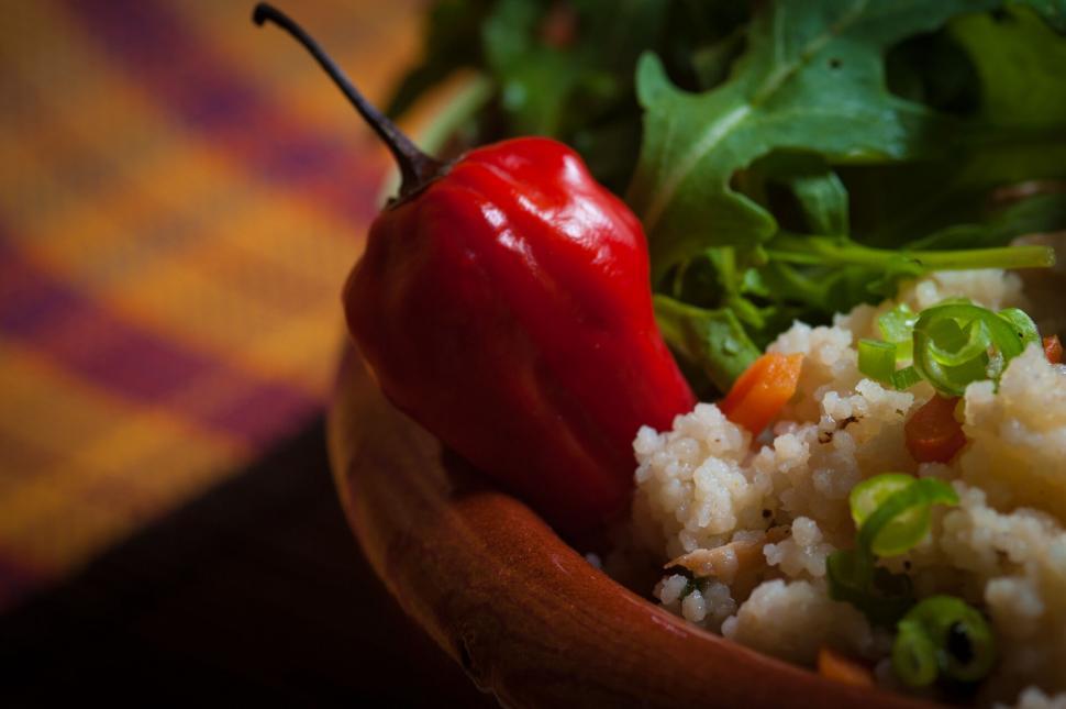 Free Image of Red chili pepper in couscous salad close-up 