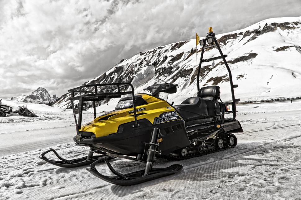 Free Image of Snowmobile on Snowy Mountain Landscape 